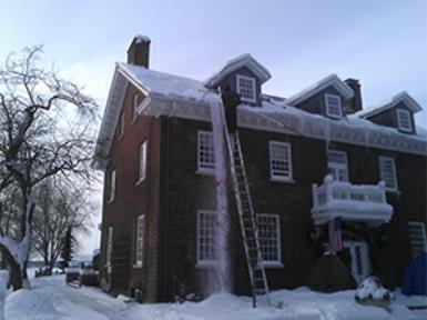 Roof raking and ice dam removal in Central Massachusetts.